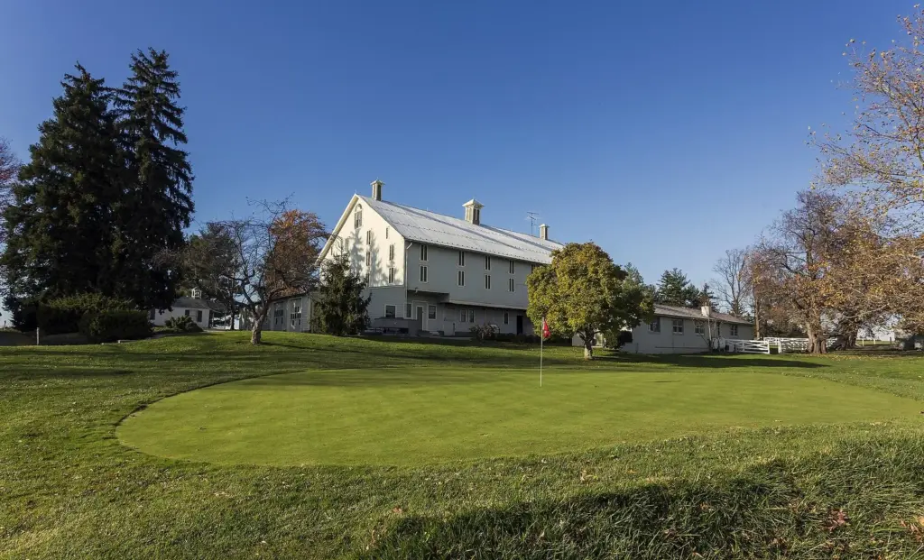 The white barn and the president's putting green at the Eisenhower farm in autumn