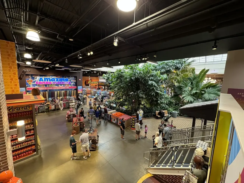 Shoppers in the bright candy store and atrium inside Hershey's Chocolate World