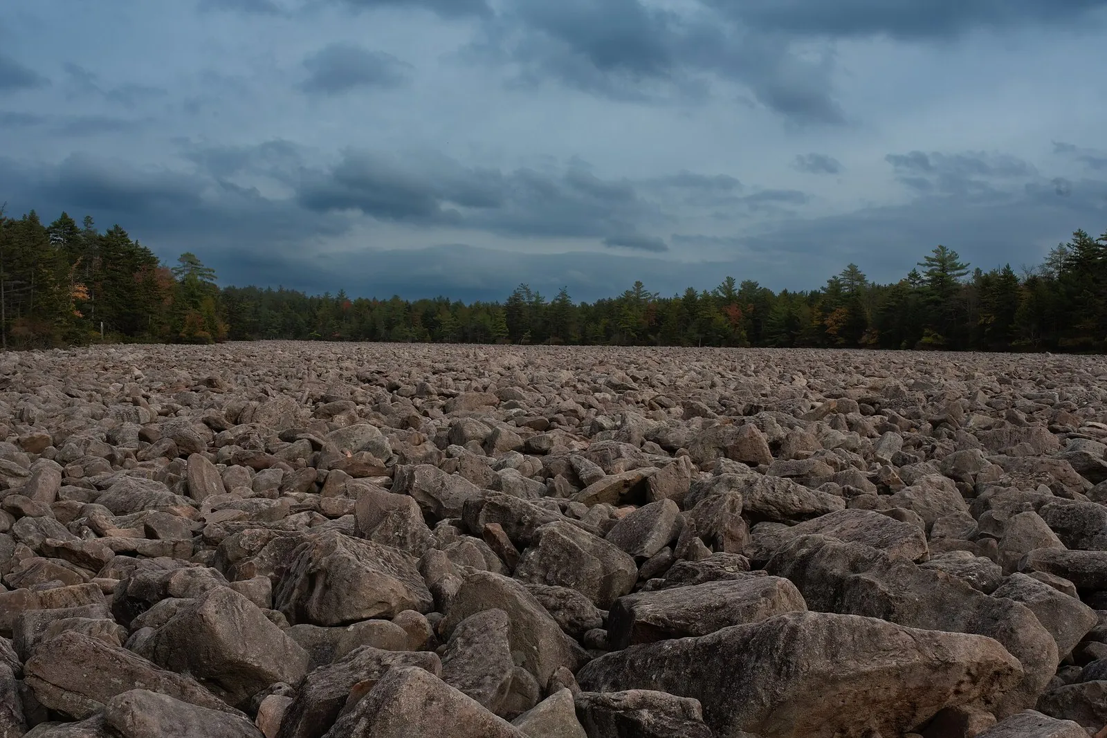 Boulder Field at Hickory Run State Park, one of the most unusual hidden gems in Pennsylvania, under a cloudy sky