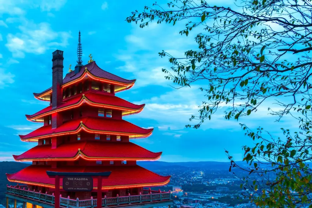 The red, seven-story Reading Pagoda on Mount Penn with the city below