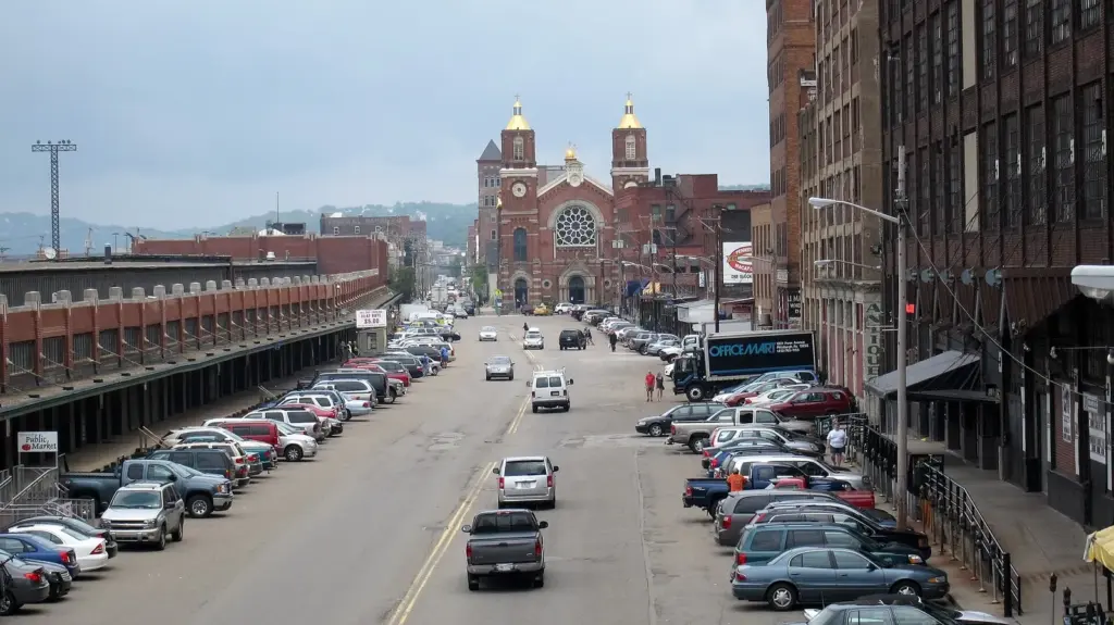 Smallman Street in the Strip District with a long produce terminal and a church with twin domes