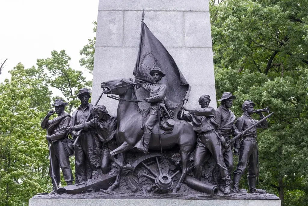 Bronze figures of Confederate soldiers and a mounted officer at the base of the Virginia Memorial at Gettysburg
