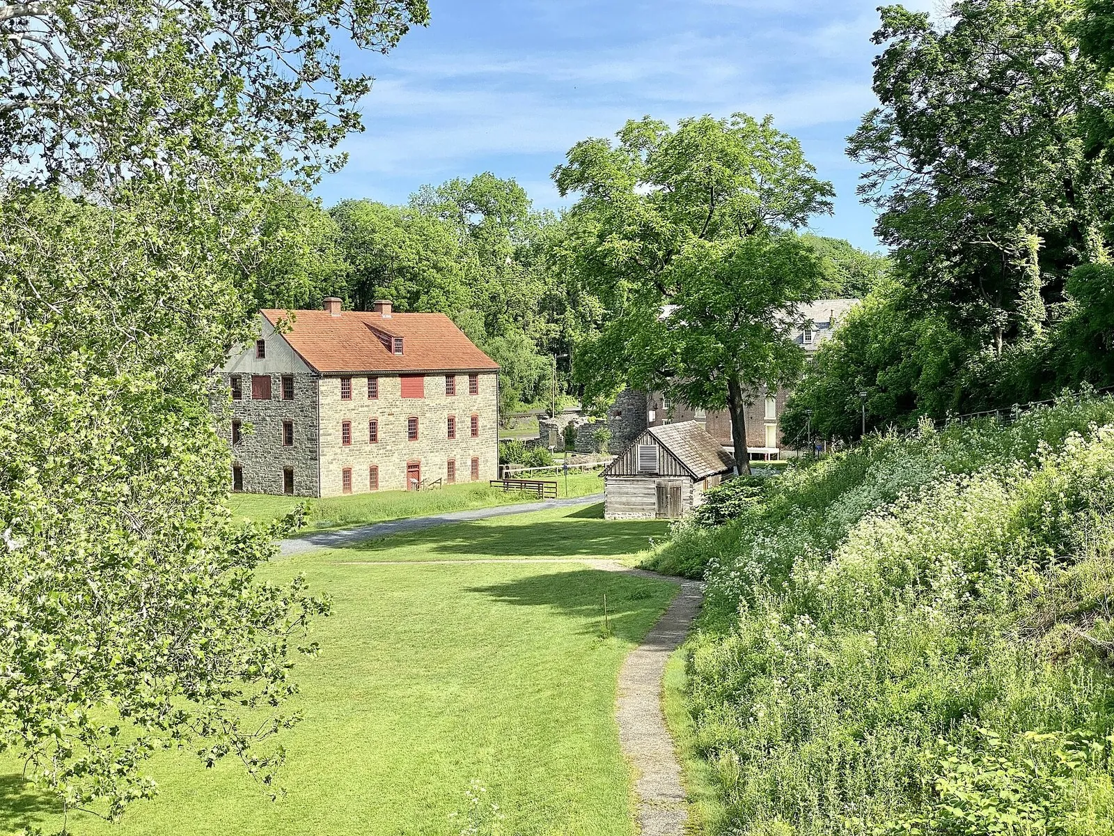 Stone mill buildings and a footpath in Bethlehem's Colonial Industrial Quarter, among the best things to do in Lehigh Valley