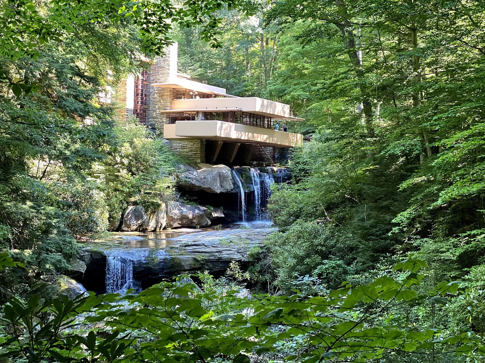 Fallingwater's stacked concrete terraces above the waterfall on Bear Run, the most famous of the things to do in the Laurel Highlands